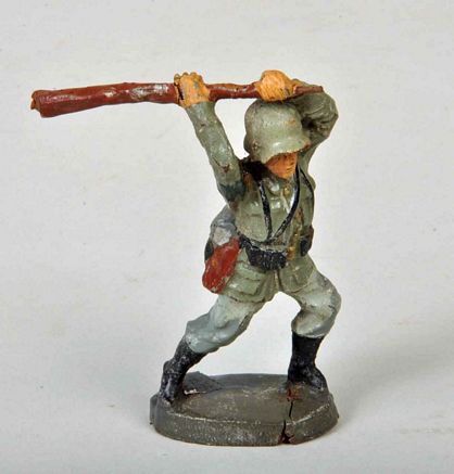 GERMAN WWII ELASTOLIN GERMAN SOLDIER USING RIFLE AS CLUB