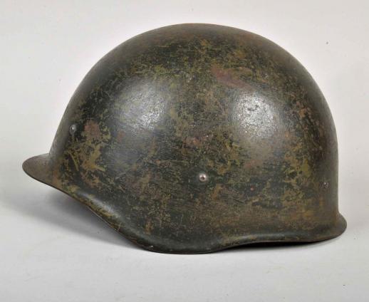 RUSSIAN WWII BATTLE DAMAGED COMBAT HELMET.