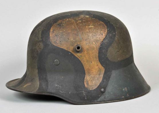 GERMAN WWI M.16 CAMOUFLAGE HELMET.