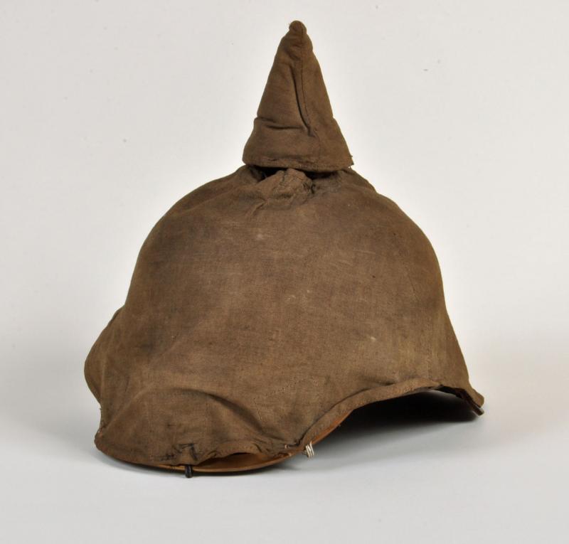 GERMAN WWI PRUSSIAN ENLISTED MANS PICKELHAUBE WITH ORIGINAL FIELD COVER.