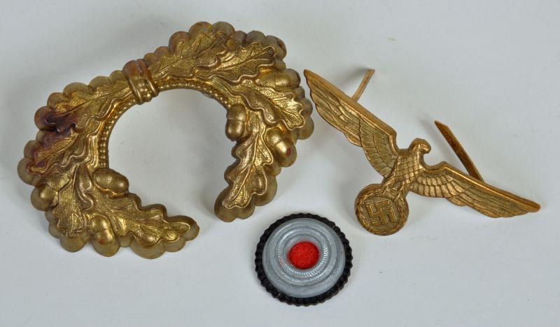 GERMAN WWII ARMY GENERAL’S PEAK CAP INSIGNIA SET.