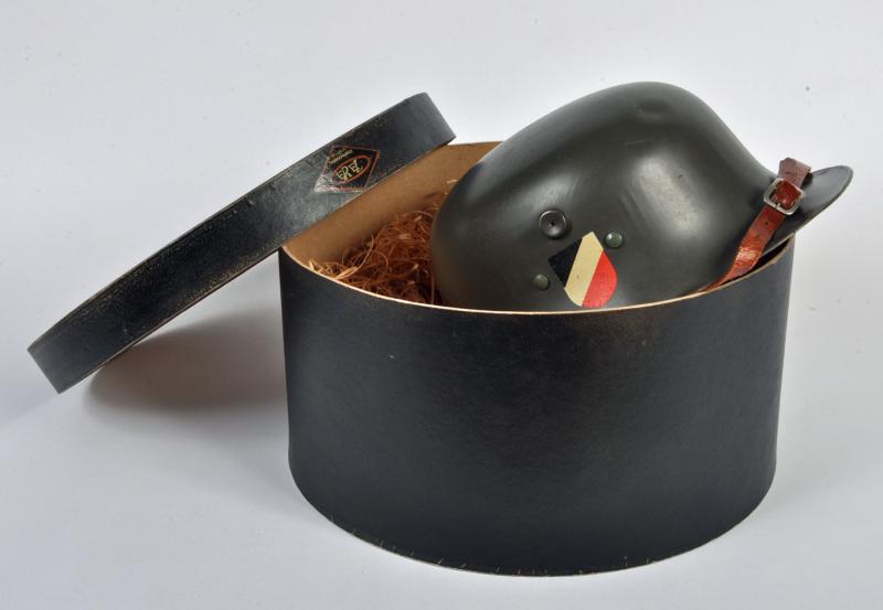 GERMAN WWII EREL BOXED CHILD’S HELMET.