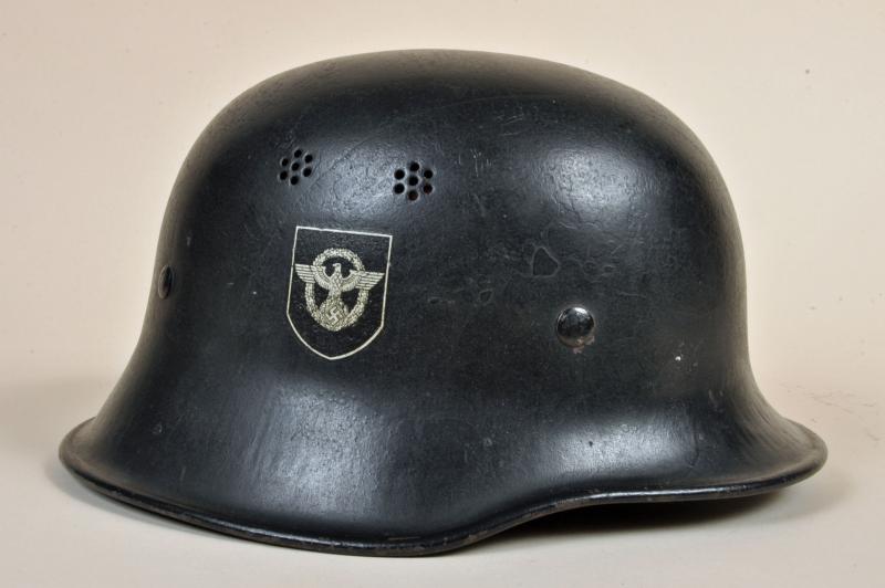 GERMAN WWII DOUBLE DECAL POLICE HELMET.