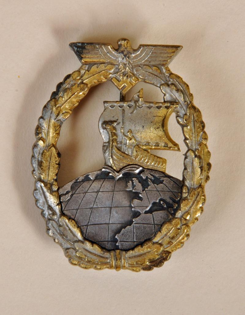 GERMAN WWII KRIEGSMARINE AUXILIARY CRUISER BADGE.