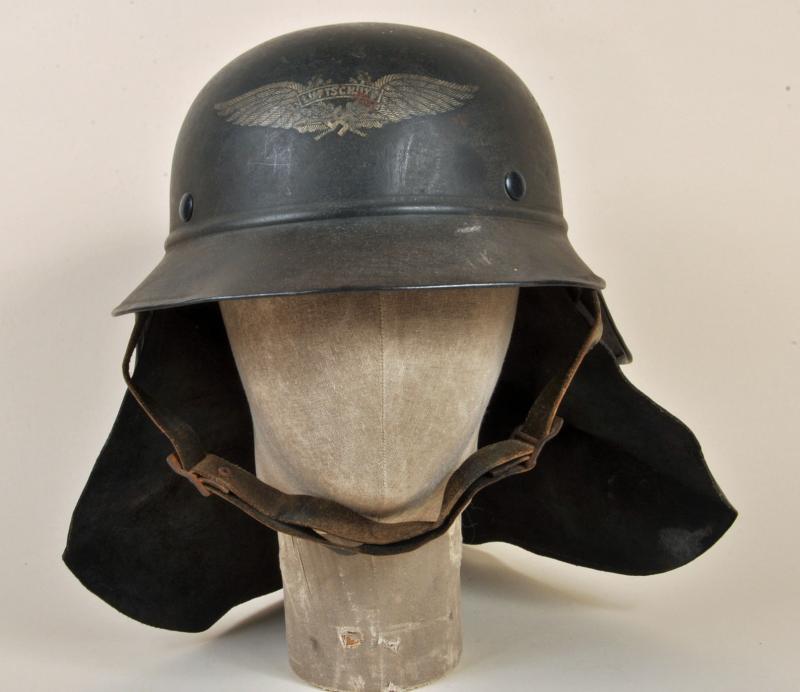 GERMAN WWII LUFTSCHUTZ GLADIATOR HELMET WITH NECK FLAP.