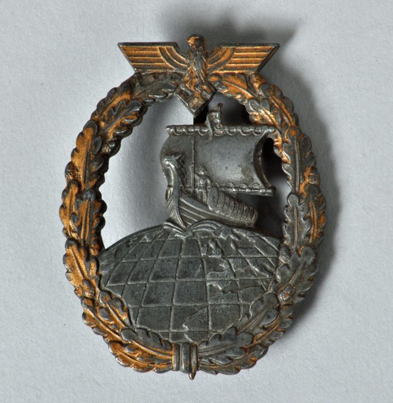GERMAN WWII NAVAL AUXILIARY CRUISER BADGE.
