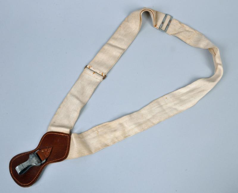 GERMAN WWII   UNDER UNIFORM BELT SWORD HANGER.