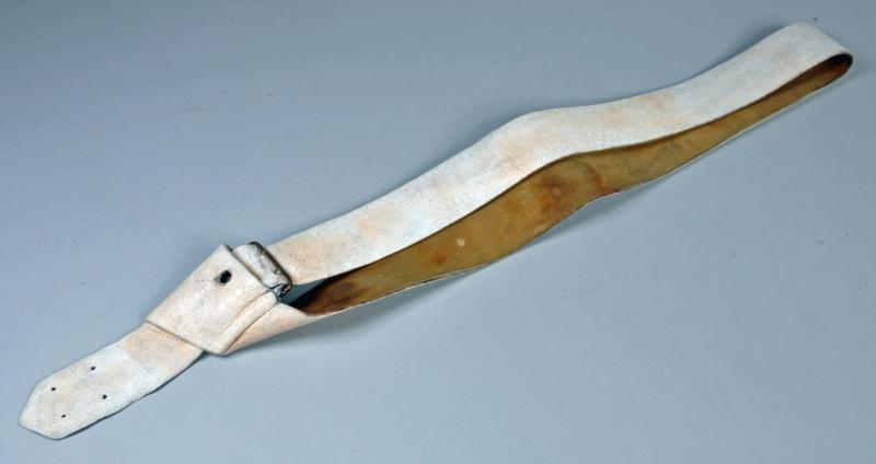 GERMAN WWI SWORD HANGER AND STRAP.