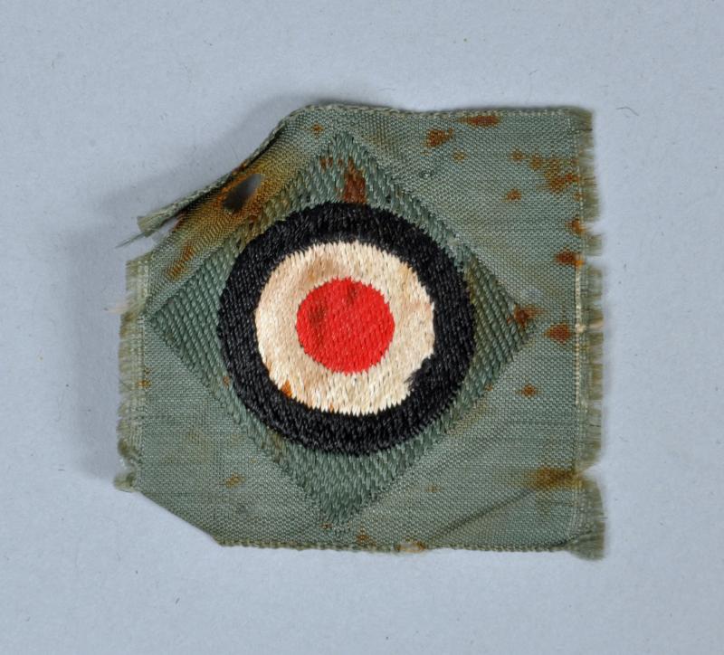GERMAN WWII OVERSEAS OR FIELD CAP ROUNDEL.