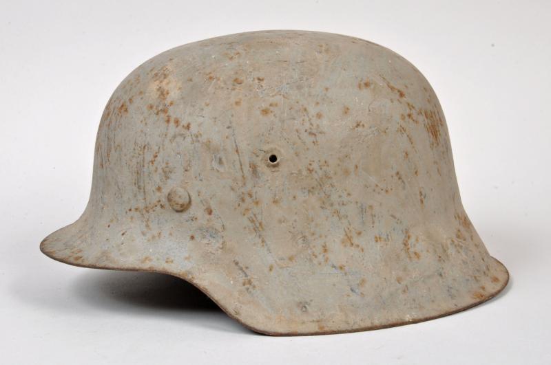 GERMAN WWII BARN FIND SNOW COVERED HELMET.