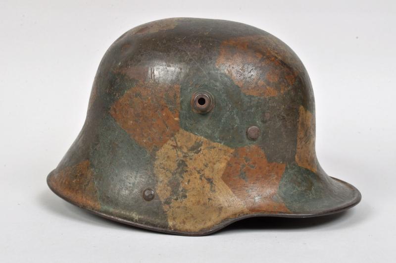 GERMAN WWI M.16 CAMOUFLAGE HELMET.