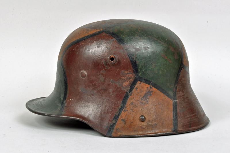 GERMAN WWI M.16 CAMOUFLAGE HELMET.