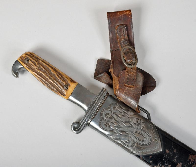 GERMAN WWII RAD MANS HEWER WITH HANGER.