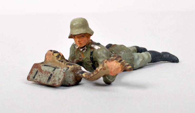 GERMAN WWII LINIOL MACHINE GUNNER ASSISTANT.