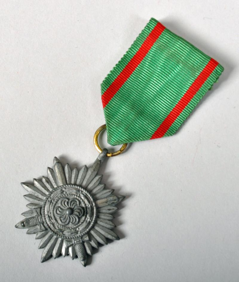 GERMAN WWII EASTERN PEOPLES MEDAL IN GOLD, 2ND CLASS WITH SWORDS.