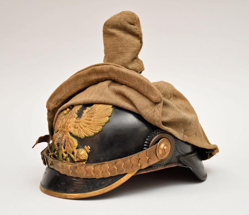 GERMAN WWI PRUSSIAN FOOT ARTILLERY RESERVE OFFICERS HELMET WITH COVER.