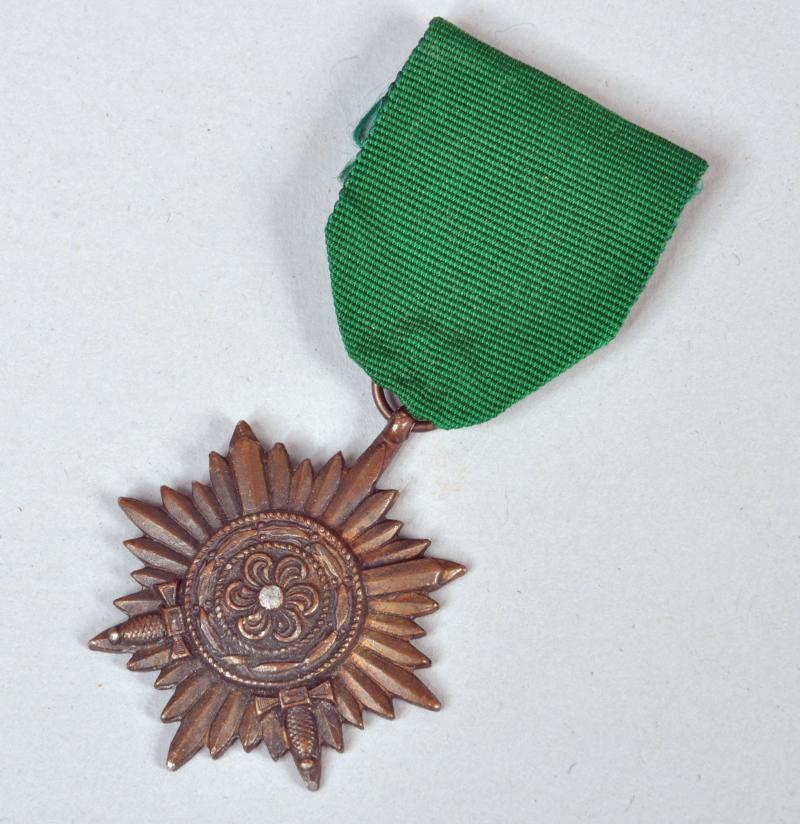 GERMAN WWII EASTERN PEOPLES MEDAL FOR BRAVERY IN BRONZE WITH SWORDS 2ND CLASS.