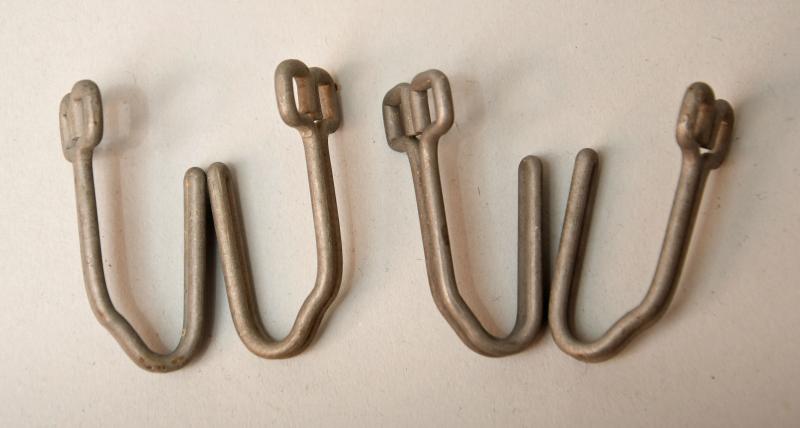 GERMAN WWII UNIFORM BELT HOOKS.