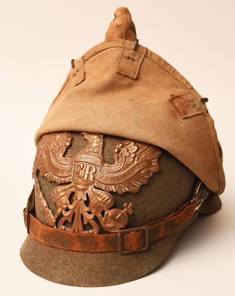 GERMAN WWI FELT PICKLEHAUBE WITH ORIGINAL COVER.