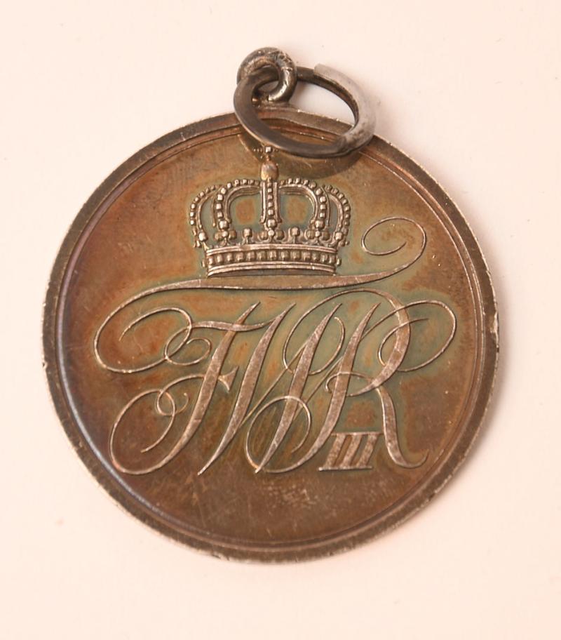 GERMAN WWI PRUSSIAN GOOD SERVICE MEDAL IN SILVER WITHOUT RIBBON.
