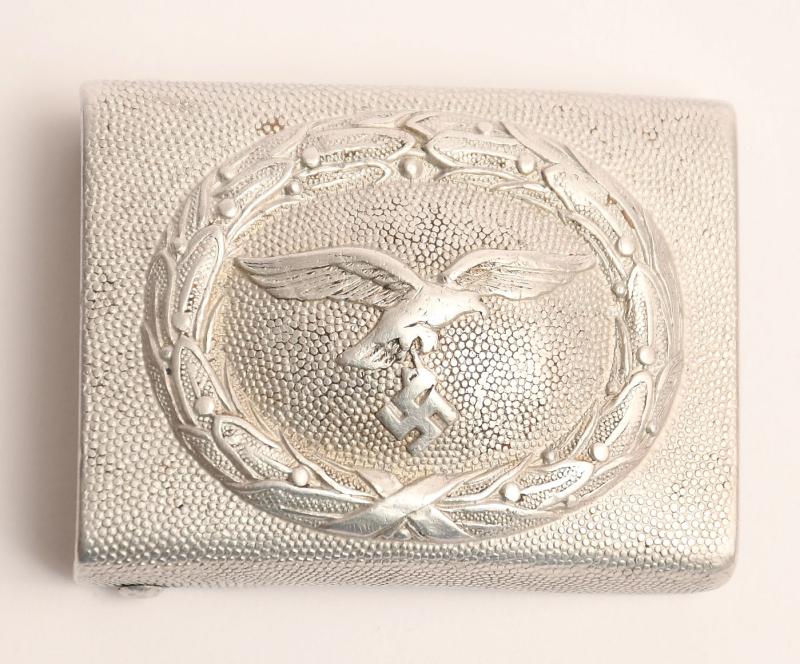 GERMAN WWII LUFTWAFFE ONE-PIECE STAMPED ALUMINIUM BUCKLE.