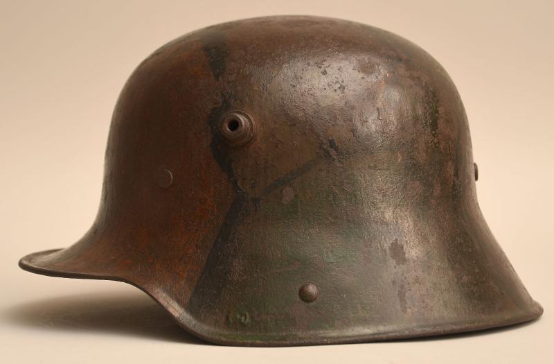 GERMAN WWI M17 CAMOUFLAGE COMBAT HELMET.