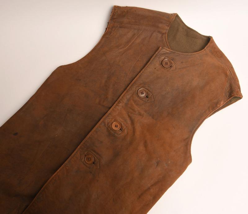 BRITISH WWII LEATHER JERKIN WITH ARTWORK.