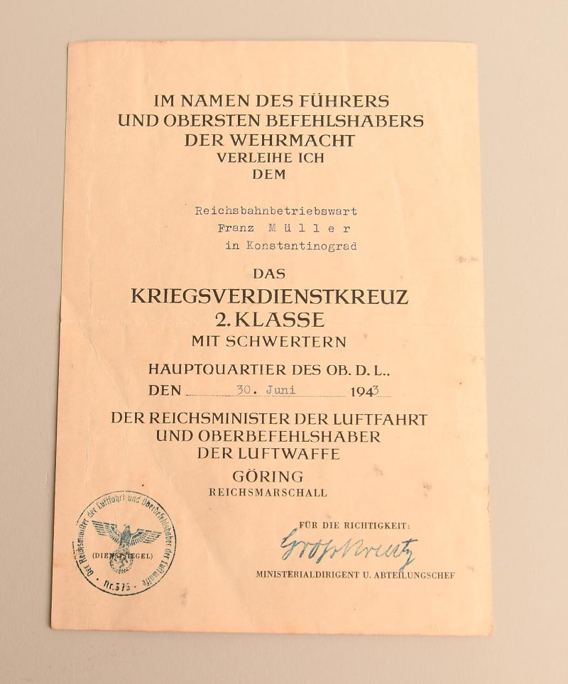 GERMAN WWII REICHBAHN/LUFTWAFFE WAR SERVICE CROSS 2ND CLASS WITH SWORDS CITATION.