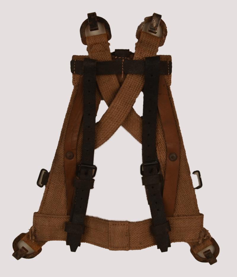 GERMAN WWII RE-ENACTOR WEBBING A FRAME.