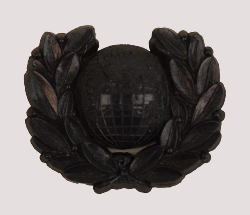 BRITISH WWII ROYAL MARINE PLASTIC COLLAR BADGE.