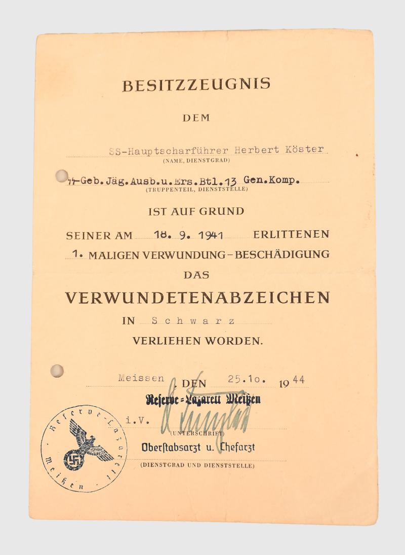 GERMAN WWII SS BLACK WOUND BADGE CITATION TO HERBERT KOSTER.
