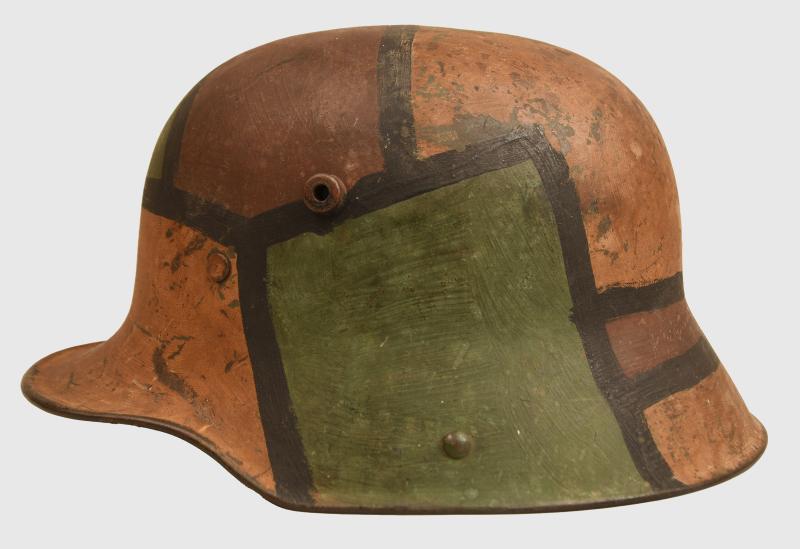 GERMAN WWI M 17 CAMOUFLAGE COMBAT HELMET.