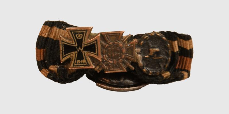 GERMAN WWI LAPEL MINIATURE IRON CROSS TRIO.
