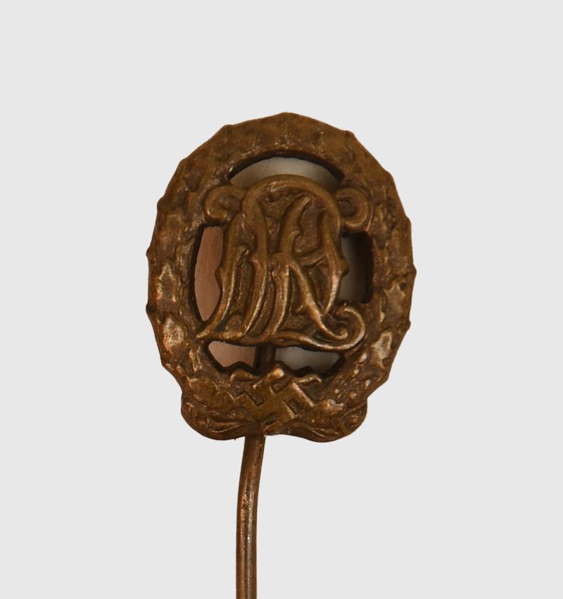 GERMAN WWII DRL BADGE IN MINIATURE.