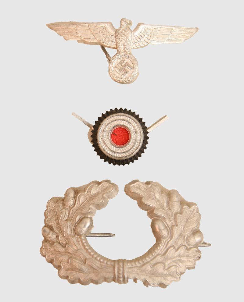 GERMAN WWII ARMY OFFICERS PEAK CAP INSIGNIA SET.