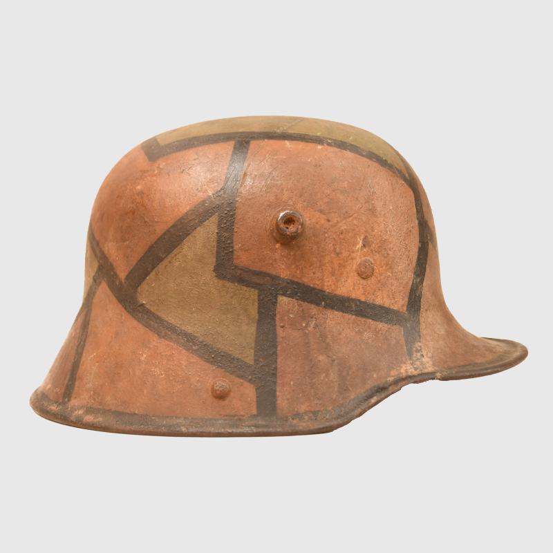 GERMAN WWI M.17 CAMOUFLAGE COMBAT HELMET.