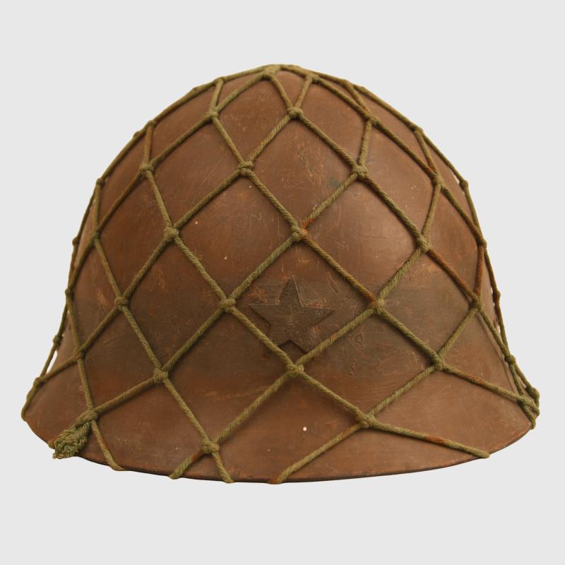 JAPANESE WWII COMBAT HELMET WITH NET COVER.