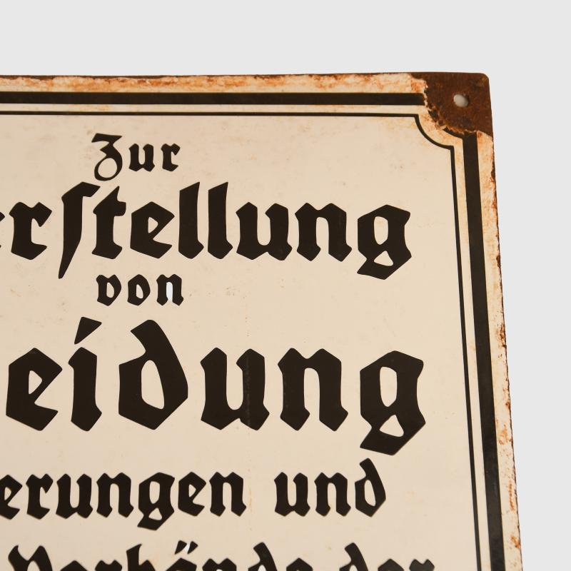GERMAN WWII RZM OFFICIAL CLOTHING SIGN.