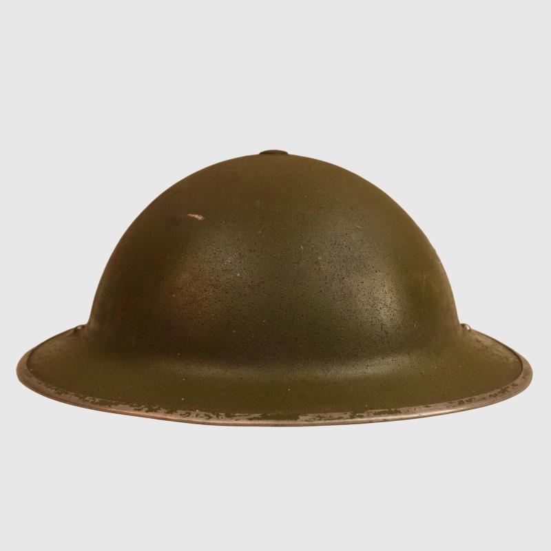 BRITISH WWII BRODIE COMBAT HELMET.