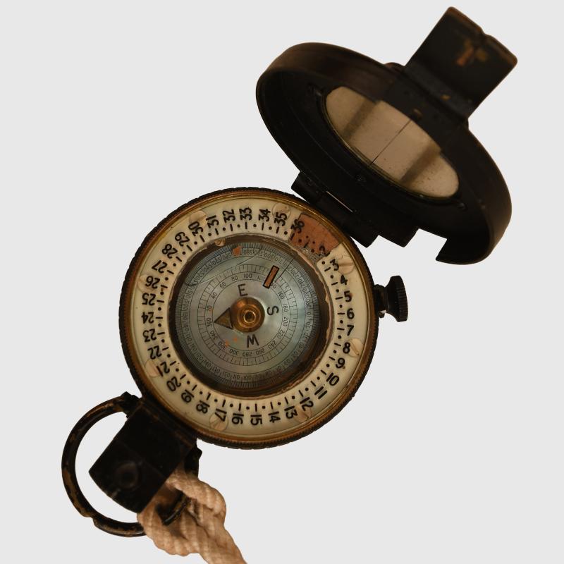 BRITISH WWII MARCHING COMPASS.