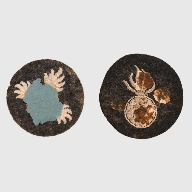 GERMAN WWII TWO LUFTWAFFE AERIAL BOMB ARMOURERS ARM BADGES.