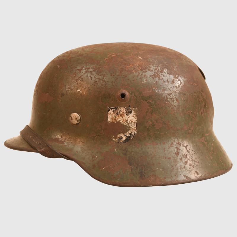 GERMAN WWII BATTLE DAMAGED M35 DOUBLE DECAL COMBAT HELMET.