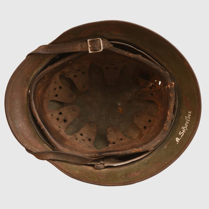 GERMAN WWII BATTLE DAMAGED M35 DOUBLE DECAL COMBAT HELMET.