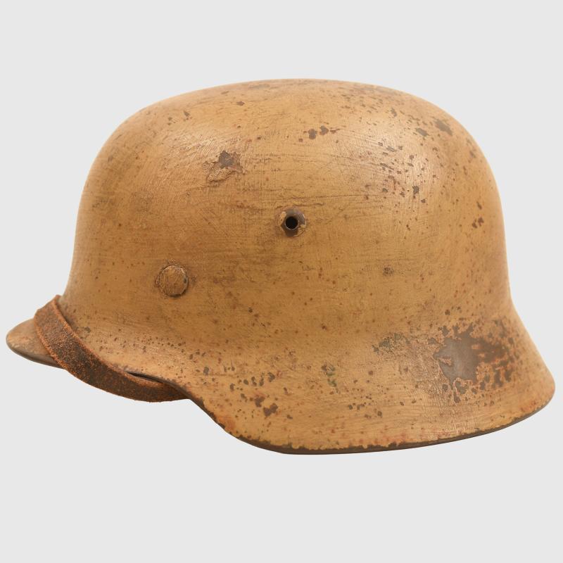 GERMAN WWII A MAGNIFICENT TROPICAL M.35 COMBAT HELMET.
