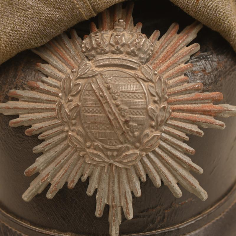 GERMAN WWI SAXON ARTILLERY FIELD GREY PICKELHAUBE WITH COVER.