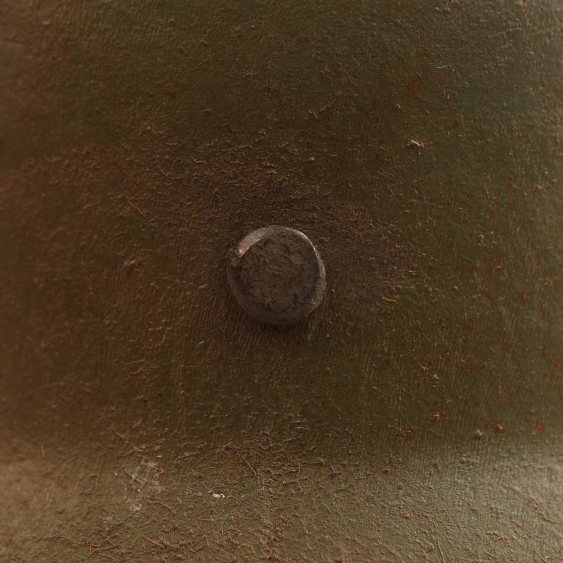GERMAN WWI M.18 CUT OUT HELMET WITH REMAINS OF FLOCK FINISH.