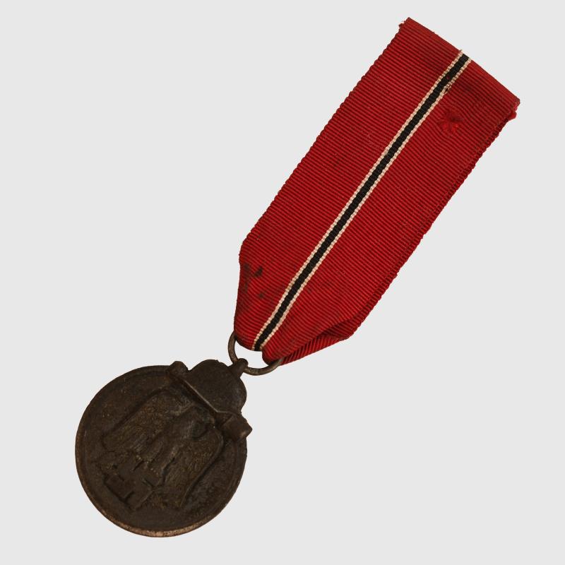 GERMAN WWII EAST FRONT MEDAL MAKER MARKED.