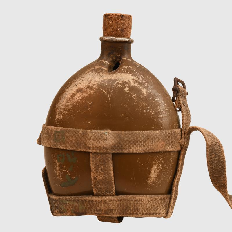 JAPANESE ARMY WATER BOTTLE, BATTLE DAMAGED.