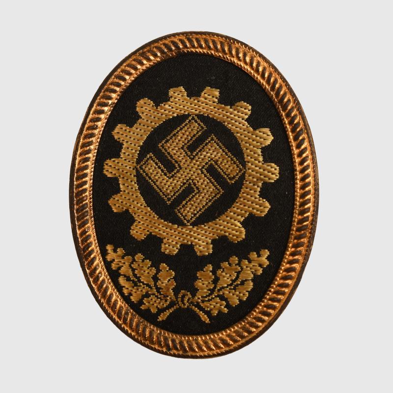 GERMAN WWII DAF CAP BADGE.