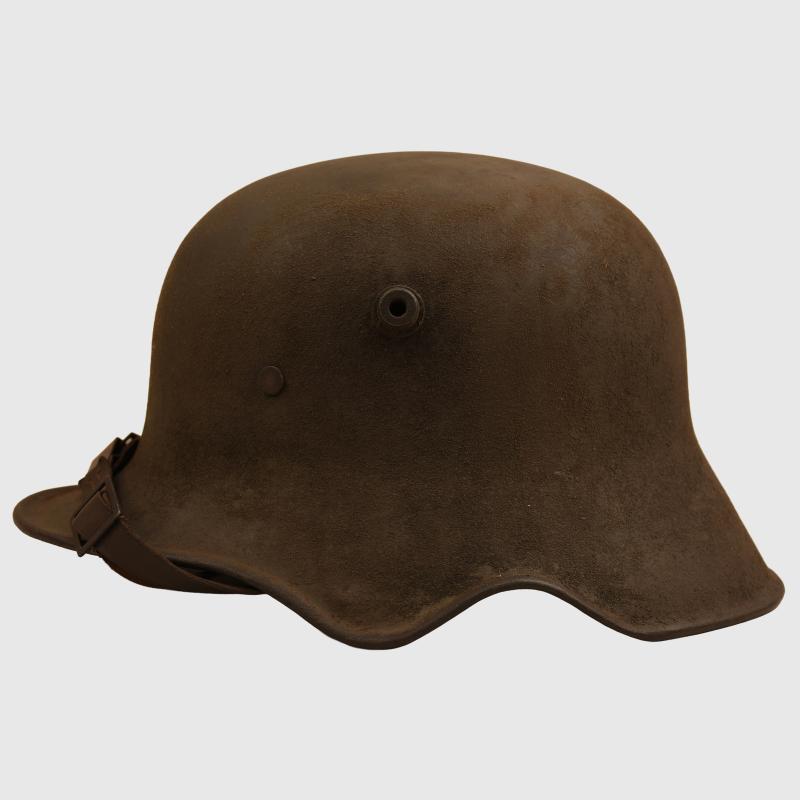 GERMAN WWI M.18 EAR CUT OUT HELMET.